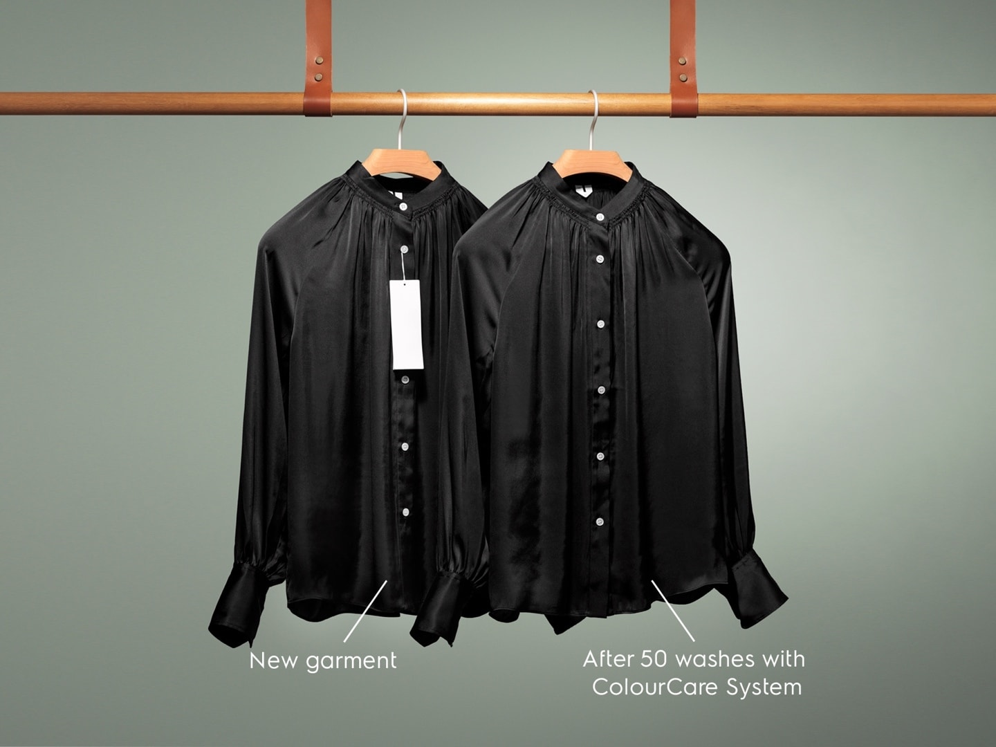 two black shirts on hangers