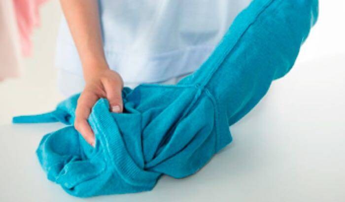 blue garment and hands 