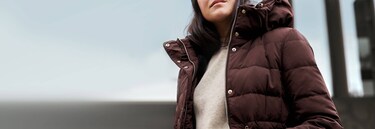 Woman in brown down jacket