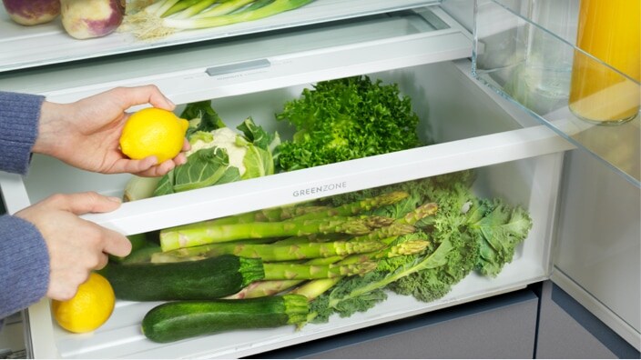 Green vegetables in sealed drawer