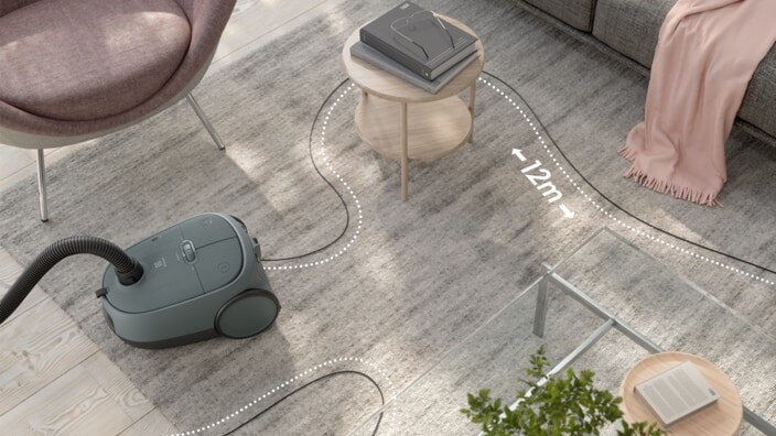 Vacuum on carpet in livingroom