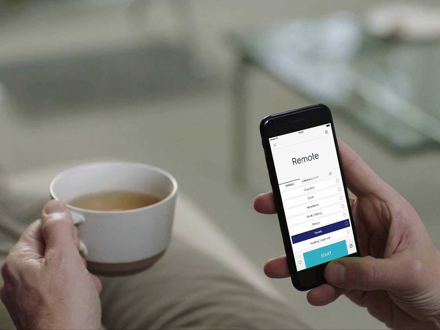 Care app on phone in hand